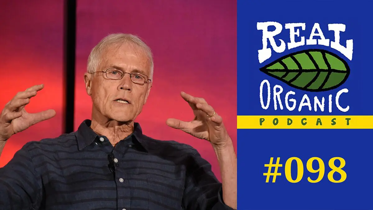 Paul Hawken, an older man with white hair and glasses, gestures while speaking for the "Real Organic Podcast #098".