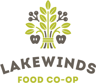 Logo for Lakewinds Food Co-op with stylized green leaves, berries, and apples above the text.