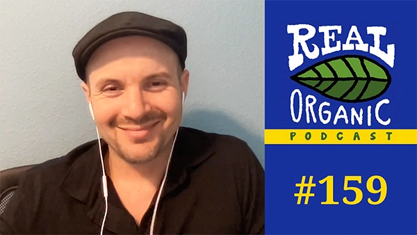 Errol Schweizer at his desk, being interviewed for the Real Organic Podcast Episode 159