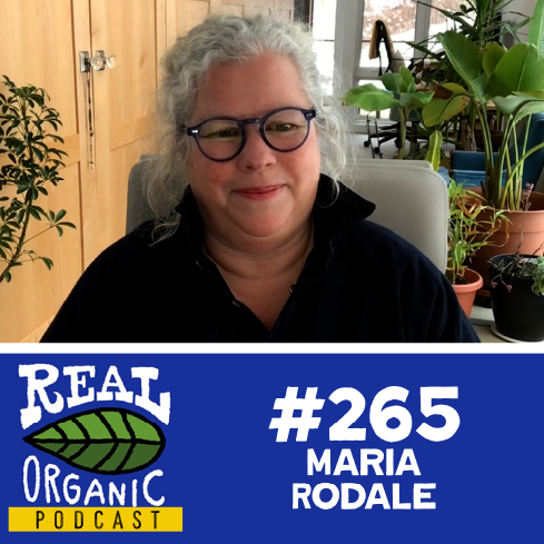 Maria Rodale surrounded by house plants in her home